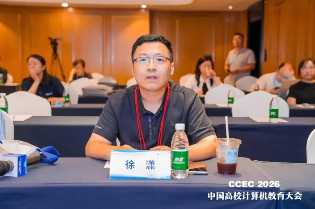 Xu Xiao, Cangjie language expert, serving as a judge at CCEC 2026